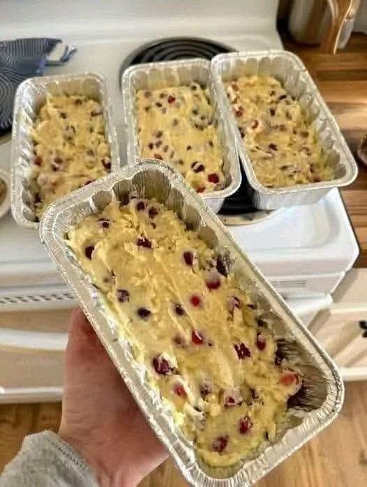 Cranberry Orange Bread with fresh cranberries, orange zest, soft moist crumb, and optional orange glaze