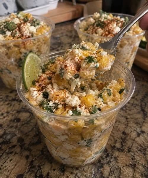 Creamy Mexican Street Corn Cups with corn, cotija cheese, lime, chili, and cilantro