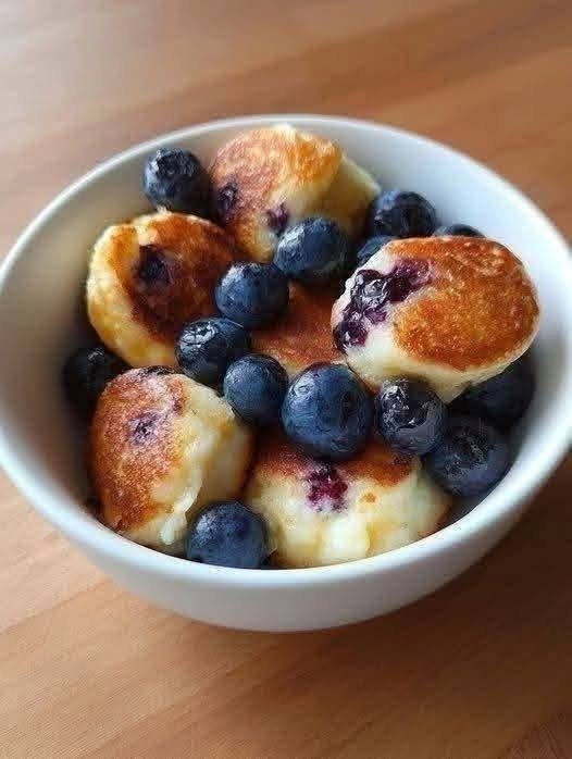 Cottage Cheese Bites with blueberries, cottage cheese, oats, eggs, and soft golden pancake-style centers